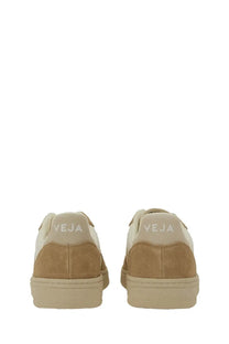 Back view of veja women’s sneaker white in tan and cream suede with minimalist design and veja logo on the heel