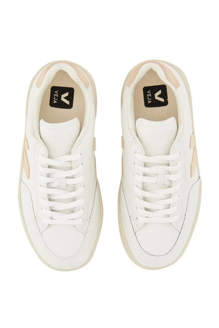 Veja women’s sneaker white featuring white vela material with beige accents and a minimalist design