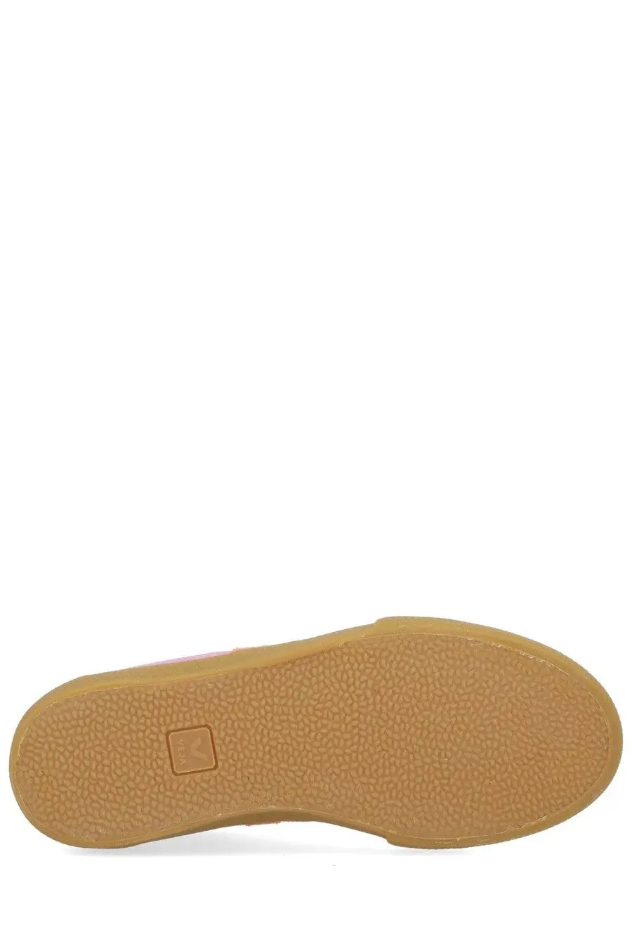 Tan rubber sole with textured grip and small square logo near heel of veja women’s volley sneaker purple back side