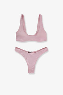 A soft pink satin nylon bikini set with a sleek minimalist design from venuja women’s nylon bikini pale collection