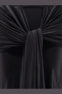 Black satin decorative knot detail on the venuja women’s shiny microfiber skirt in black