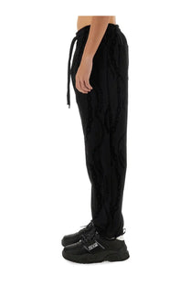 Versace Jeans Couture men’s black velvet jogging pants with all over chain embossed pattern and drawstring waist