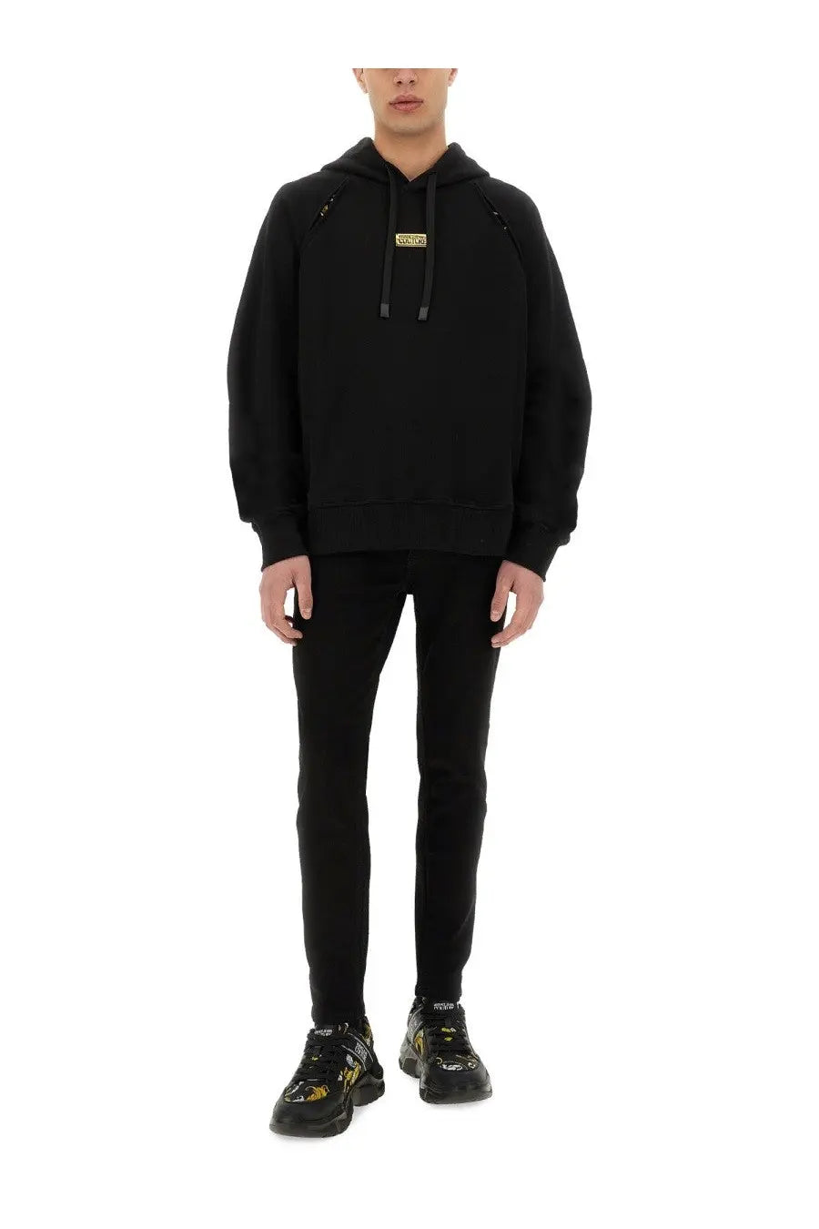 Versace Jeans Couture men’s black hooded sweatshirt with gold-tone logo patch and contrasting black drawstrings