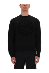 Versace jeans couture men’s black long-sleeved jersey sweater with raised circular logo and embossed v center