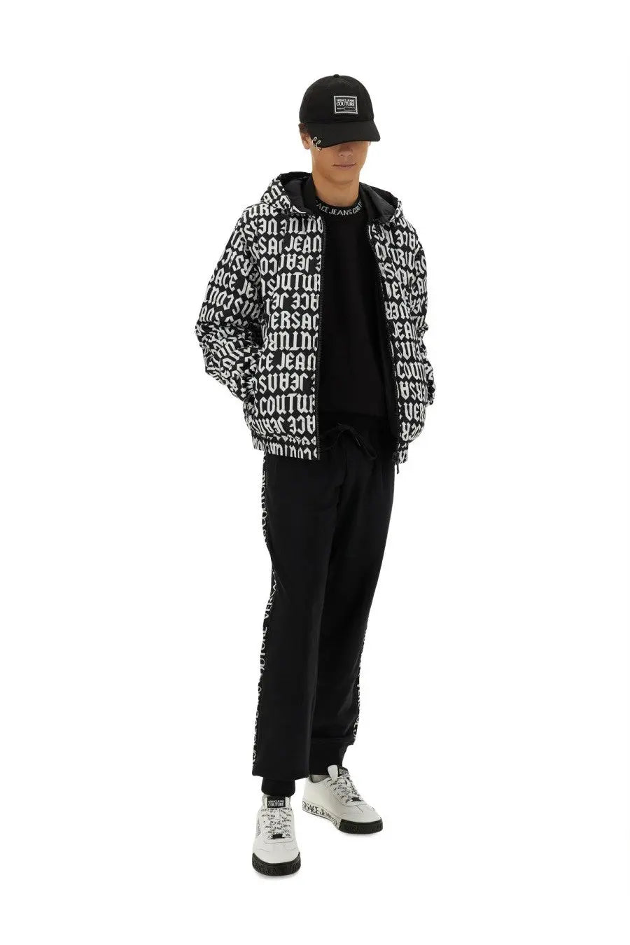Black hoodie jacket with white repeating text pattern from Versace Jeans Couture men’s jogging pants black collection