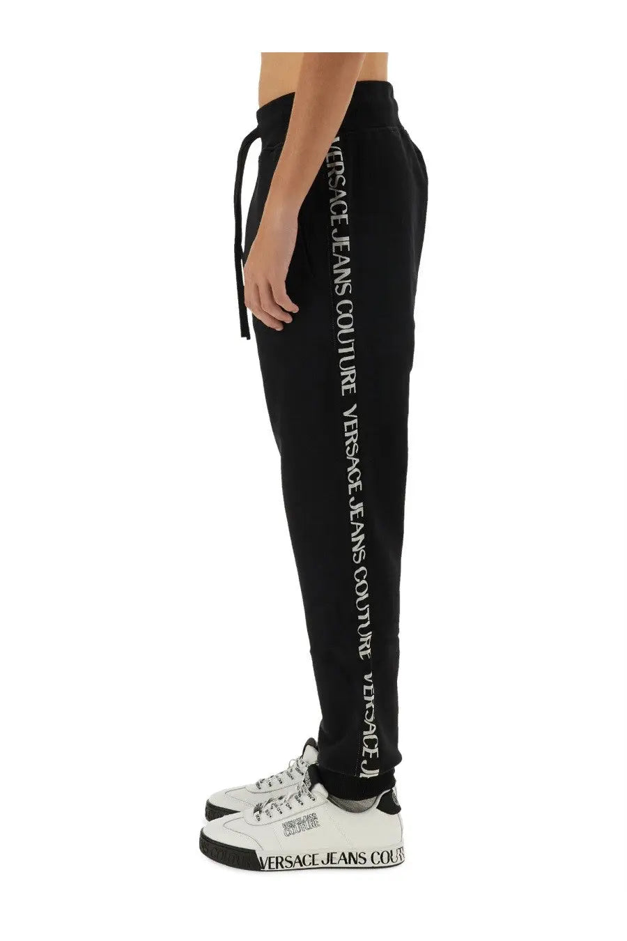 Versace Jeans Couture men’s black sweatpants with white vertical lettering down the side for jogging and casual wear