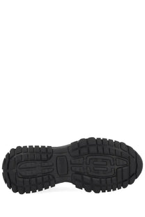 Black rubber sole with chunky textured tread and embossed logo on versace jeans couture men’s new trail sneaker black