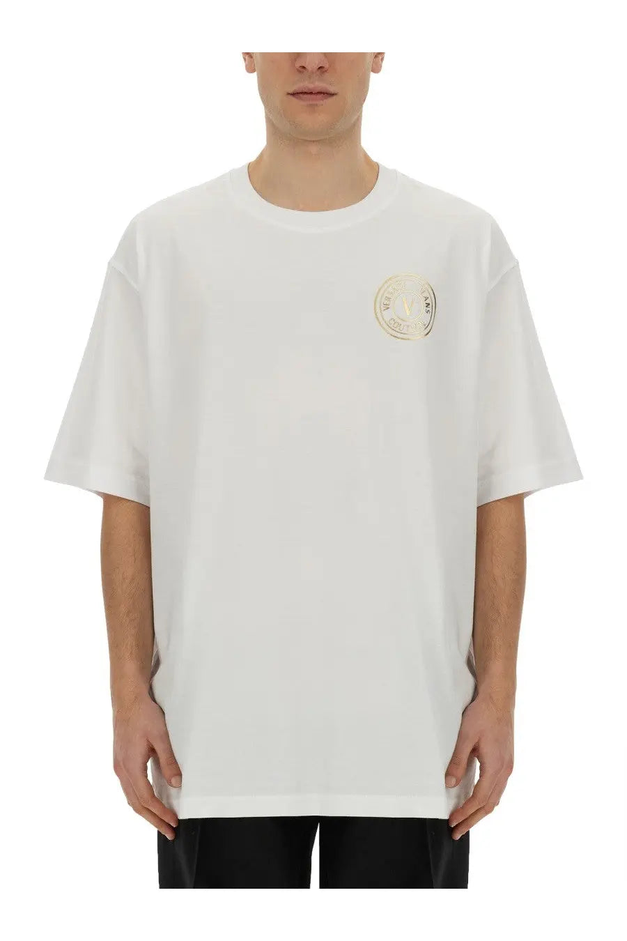 White oversized crewneck t-shirt with subtle gold circular logo on left chest from versace jeans couture mens shirt white