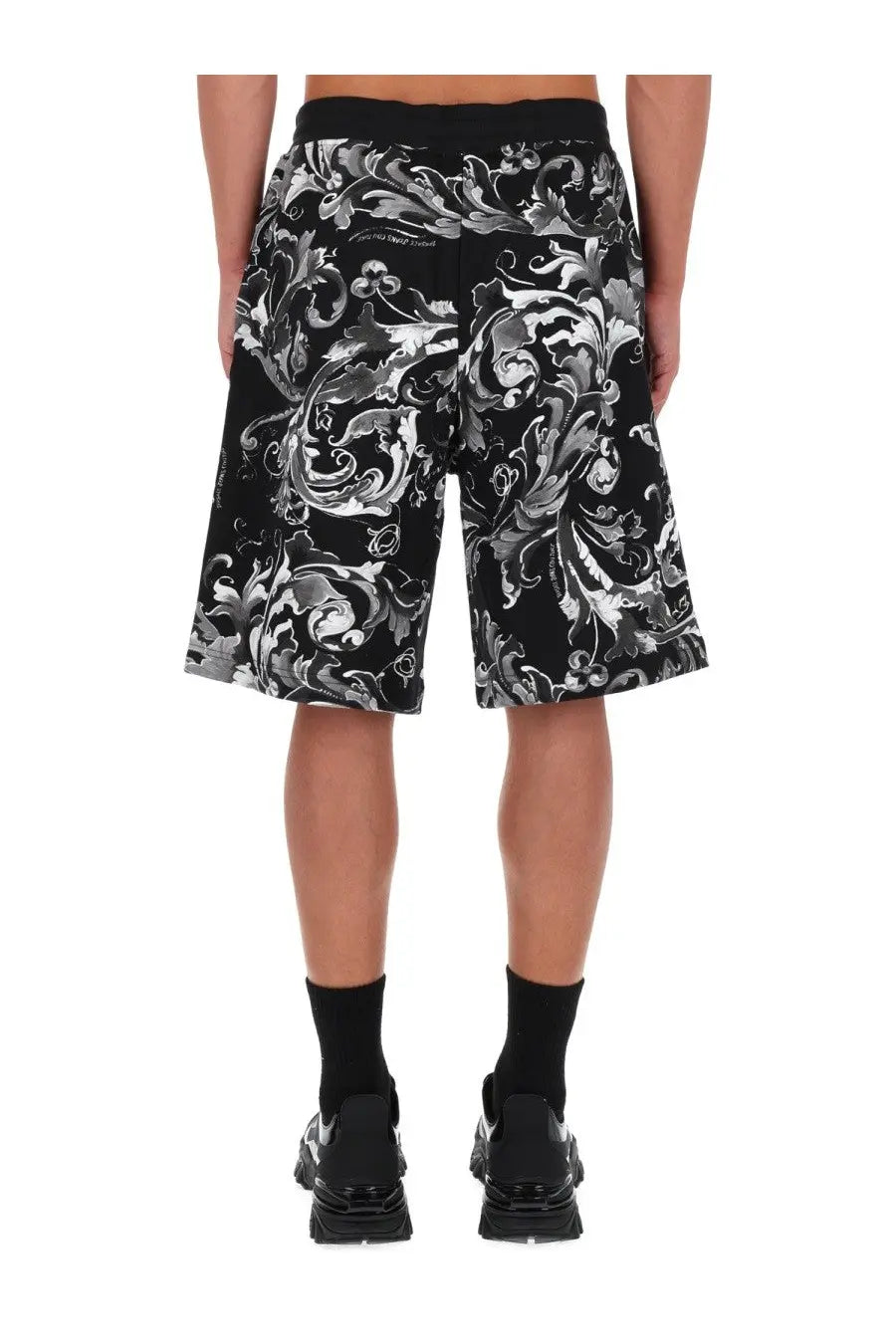 Versace jeans couture men’s black shorts with intricate silver and white porcelain baroque floral pattern