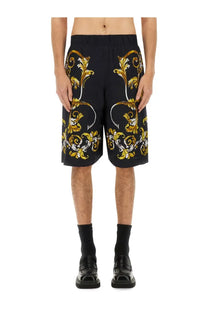 Versace Jeans Couture men’s black shorts with relaxed fit and ornate gold and white baroque-inspired pattern