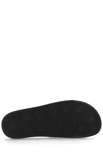 Black rubber sole with hexagonal tread pattern on versace jeans couture men’s black slides