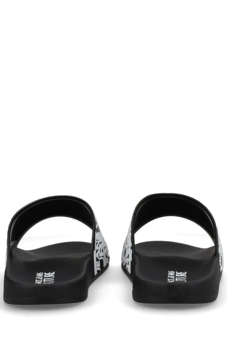 Versace jeans couture men’s black slide sandals with bold white graphic pattern and branding on the heel back side