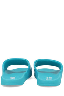Versace Jeans Couture men’s turquoise rubber slide sandals with minimalist design and ocean brand on the insole