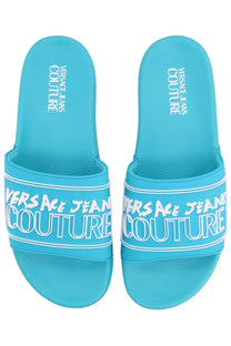 Versace jeans couture men’s turquoise blue slide sandals with bold white lettering across the strap