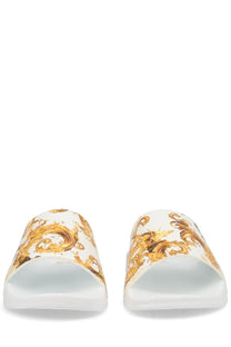 Versace jeans couture men’s white slide sandals featuring an ornate gold baroque pattern on the strap