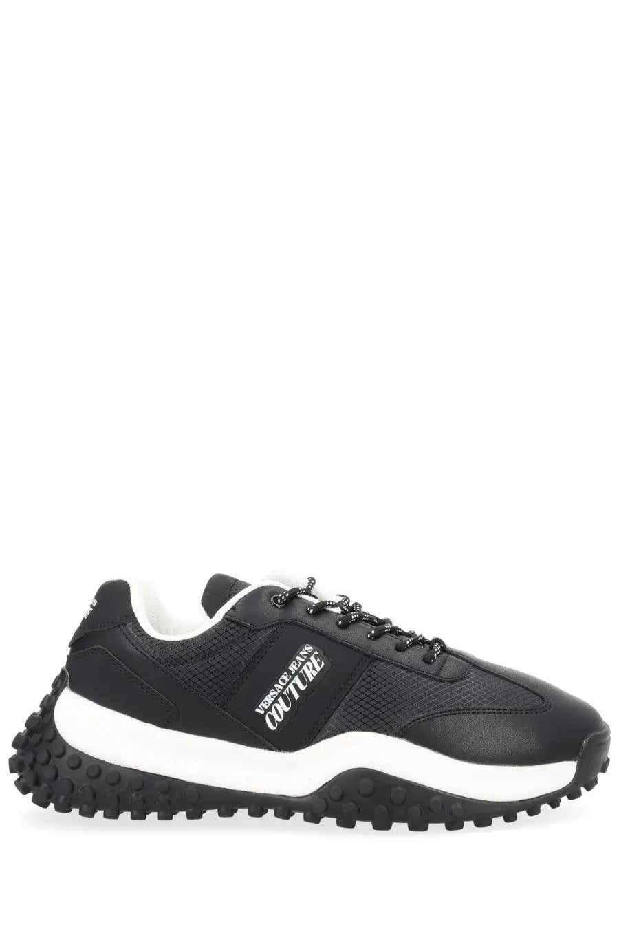 Versace Jeans Couture men’s sneaker con black with textured upper, white midsole, and chunky black rubber outsole