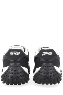 Versace jeans couture men’s sneaker con black with black and white leather upper and textured bumpy rubber sole