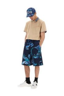 Navy blue versace jeans couture men’s sports shorts with vibrant teal and light blue baroque floral patterns