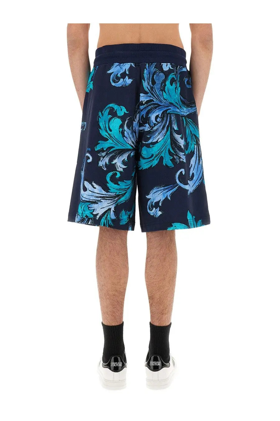 Navy blue versace jeans couture men’s sports shorts with vibrant teal and light blue baroque floral patterns