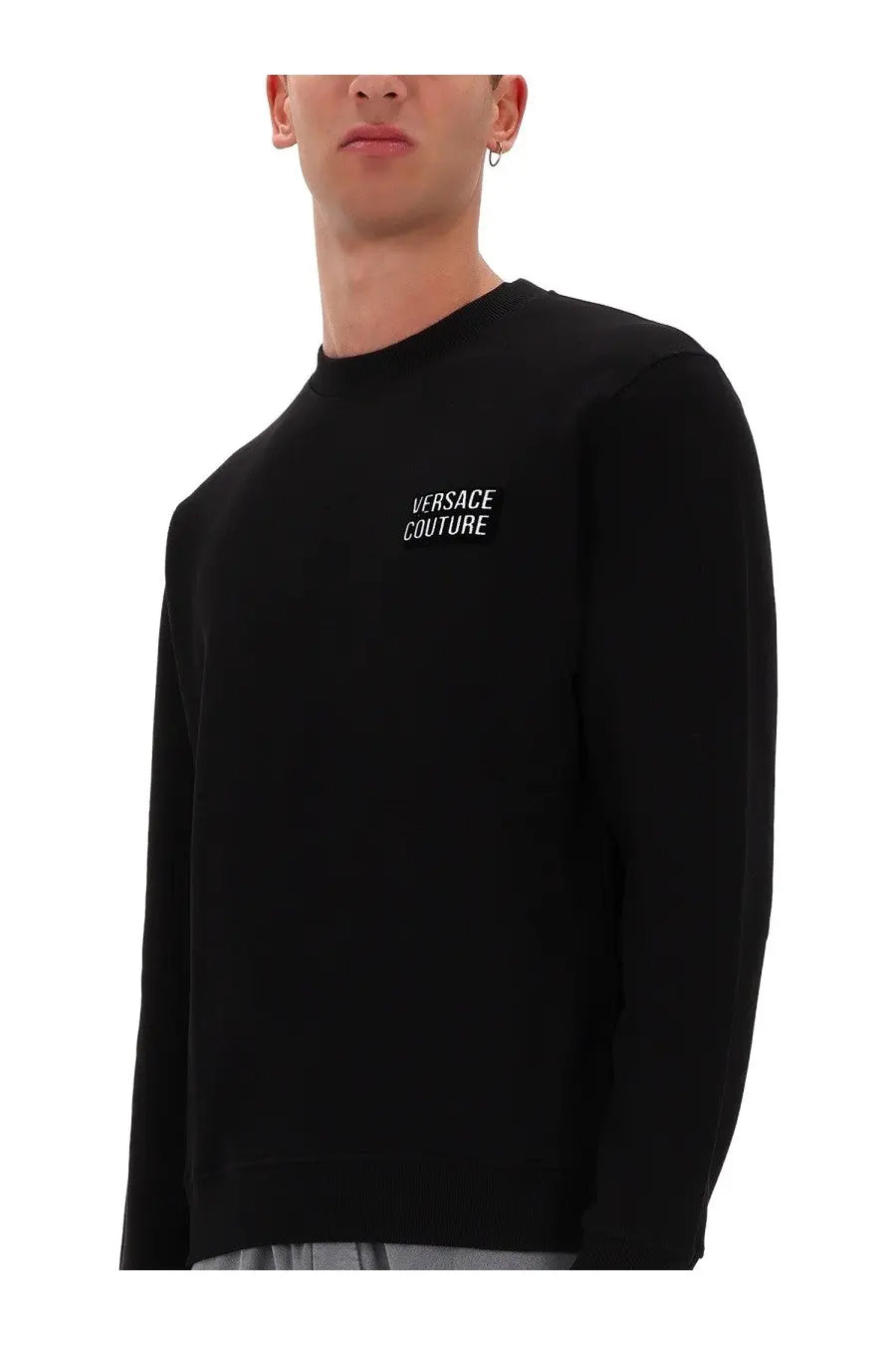 Versace Jeans Couture men’s black long-sleeved crewneck sweatshirt with white embroidered logo on left chest