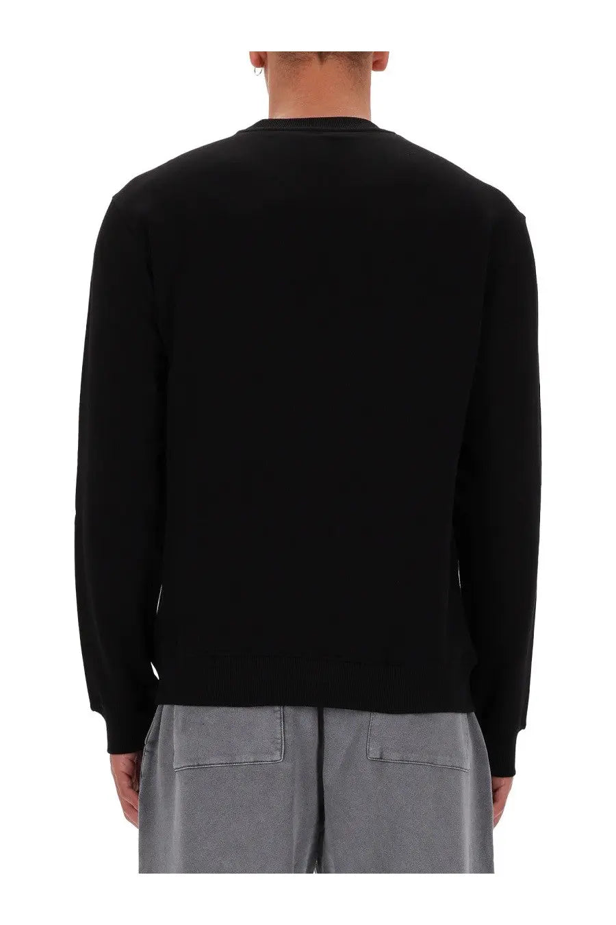Black long-sleeved knit crew neck sweatshirt by Versace Jeans Couture for men