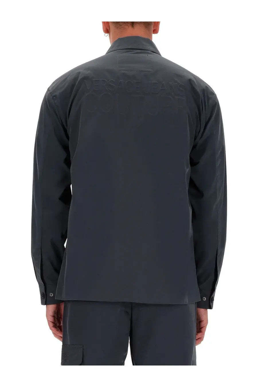 Dark gray versace jeans couture men’s zippered long-sleeved shirt showing back with subtle embossed text across it