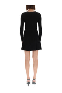 Versace Jeans Couture women’s black knit mini dress with long sleeves and flared hem in baroque buckle style