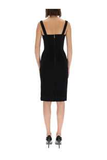 Back view of versace jeans couture women’s black velvet sheath dress with thin straps and central back zipper