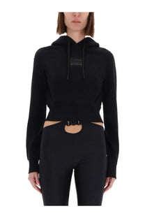 Black versace jeans couture women’s cropped hoodie with front chest patch and stylish side cutouts