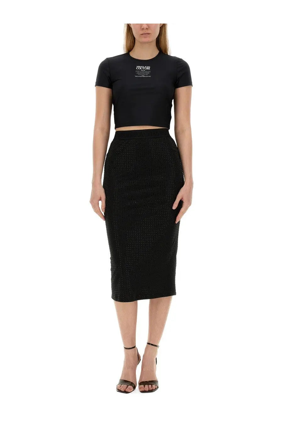 Black textured Versace Jeans Couture women’s crystal pencil skirt with fitted silhouette and subtle perforated detailing