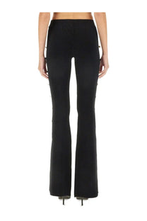 Versace Jeans Couture women’s black cut out pants with sleek stretchy fabric and subtle side button detailing