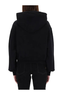Black oversized hoodie with relaxed fit and ribbed cuffs from versace jeans couture women’s emblem baroque sweatshirt