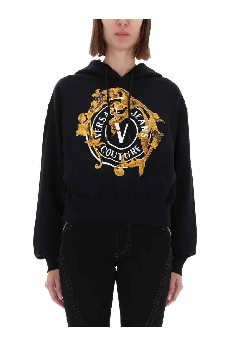 Versace Jeans Couture women’s black cropped hoodie with bold gold and white logo and ornate baroque detailing
