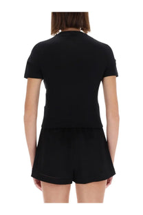 Versace Jeans Couture women’s black emblem shirt with short sleeves high neckline and subtle seam detailing