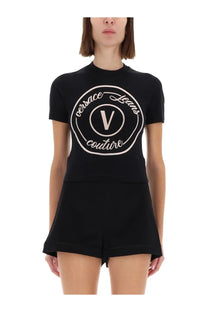 Versace Jeans Couture women’s black short-sleeved t-shirt with white embroidered emblem featuring central v design