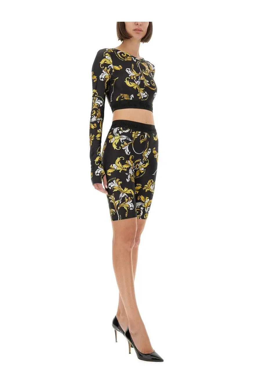 Versace jeans couture women’s black cycling shorts with gold baroque outline pattern in stretch fabric