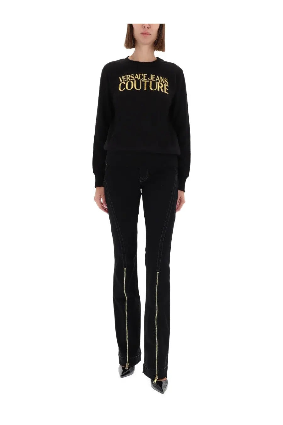 Black versace jeans couture women’s sweatshirt with gold lettering across the chest for stylish casual wear