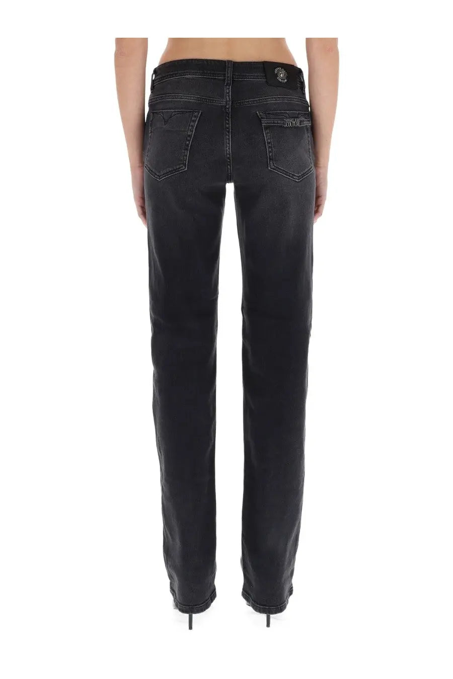 Versace Jeans Couture women’s black denim pants with straight-leg cut and frayed hems in a front view