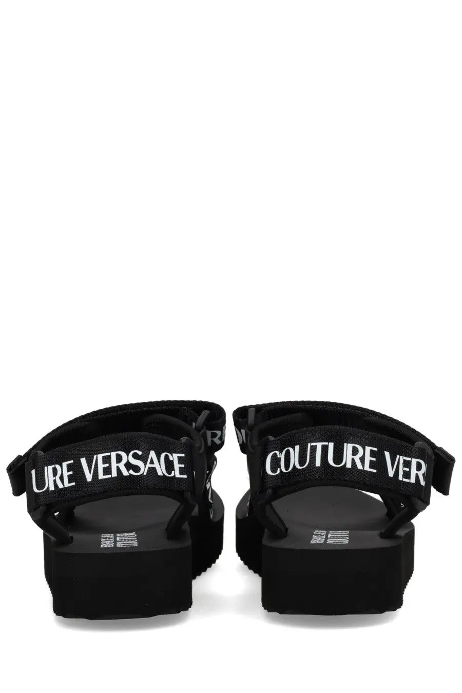 Versace Jeans Couture women’s black platform sandals with bold white couture versace lettering on straps