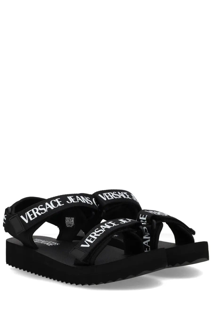 Versace Jeans Couture women’s black sandal with white logo straps and chunky rubber sole for casual wear
