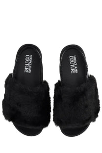 Versace jeans couture women’s black sandal shelly featuring black faux fur slide design for casual wear