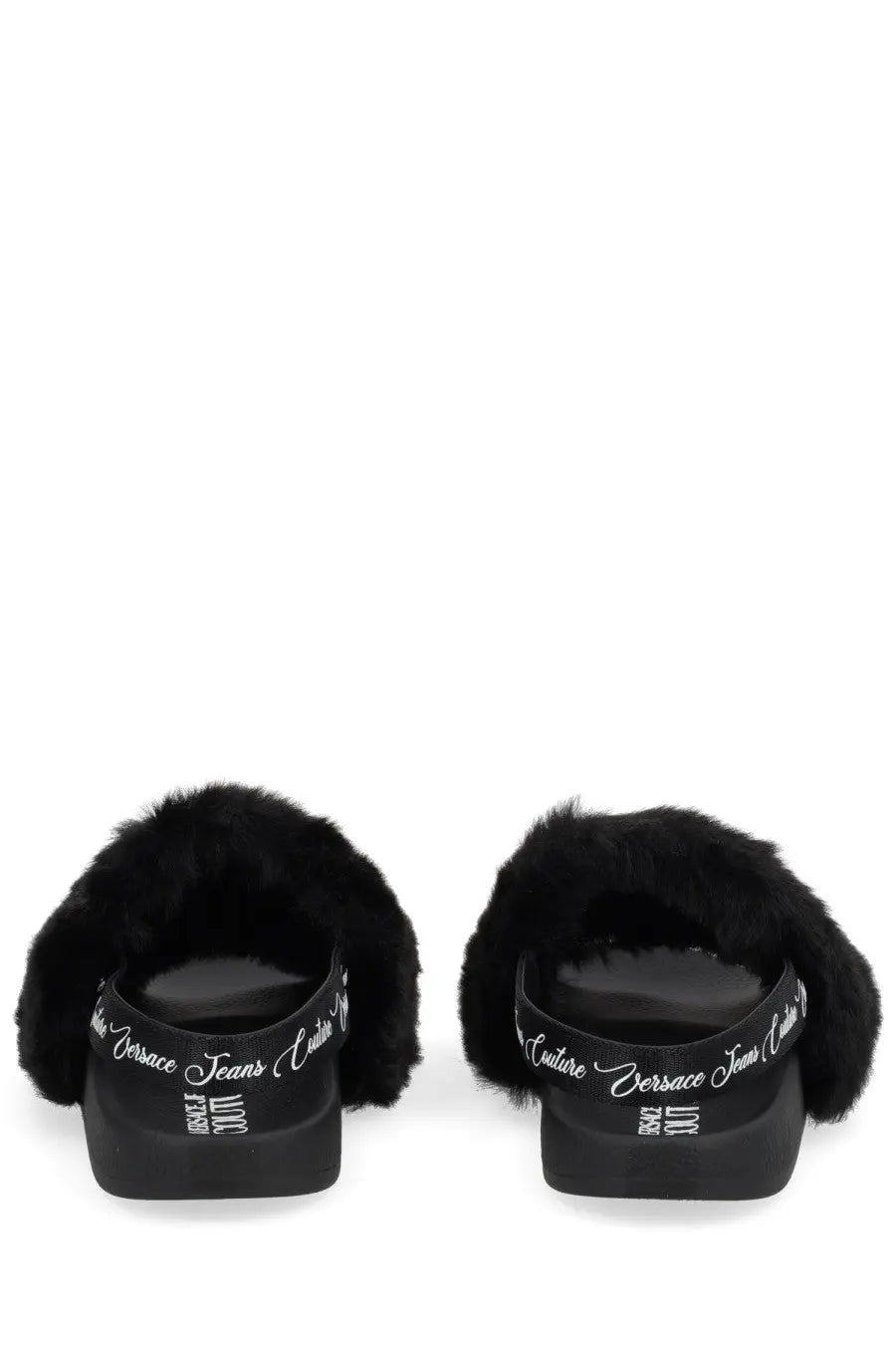 Versace jeans couture women’s black furry slide sandals with glossy rubber sole and white cursive branding on the heel back