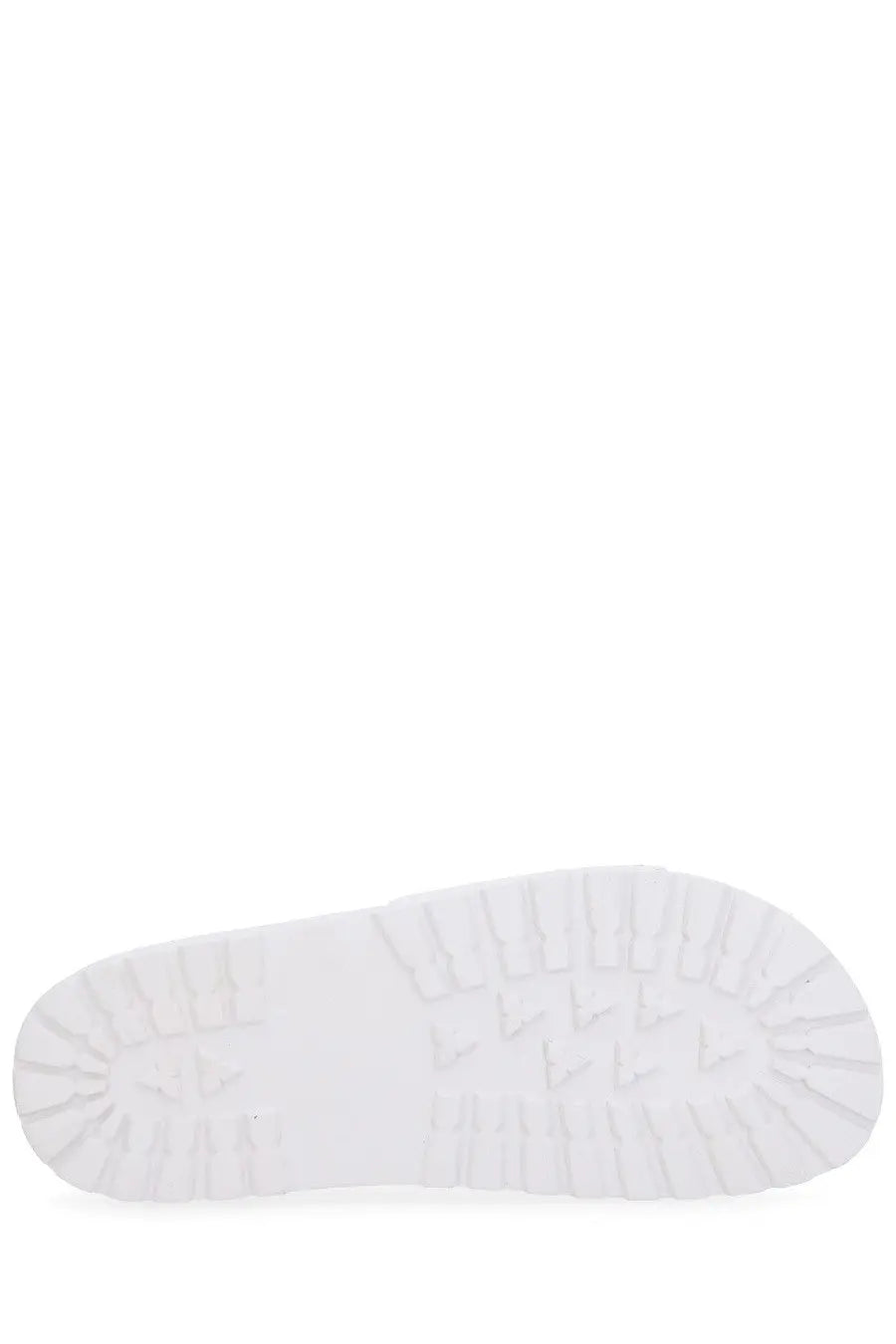 White rubber sole with textured tread on the back of versace jeans couture women’s sandal shelly white