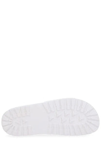 White rubber sole with textured tread on the back of versace jeans couture women’s sandal shelly white