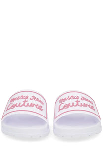 White versace jeans couture women’s slide sandals with pink embroidered branding in a shelly design