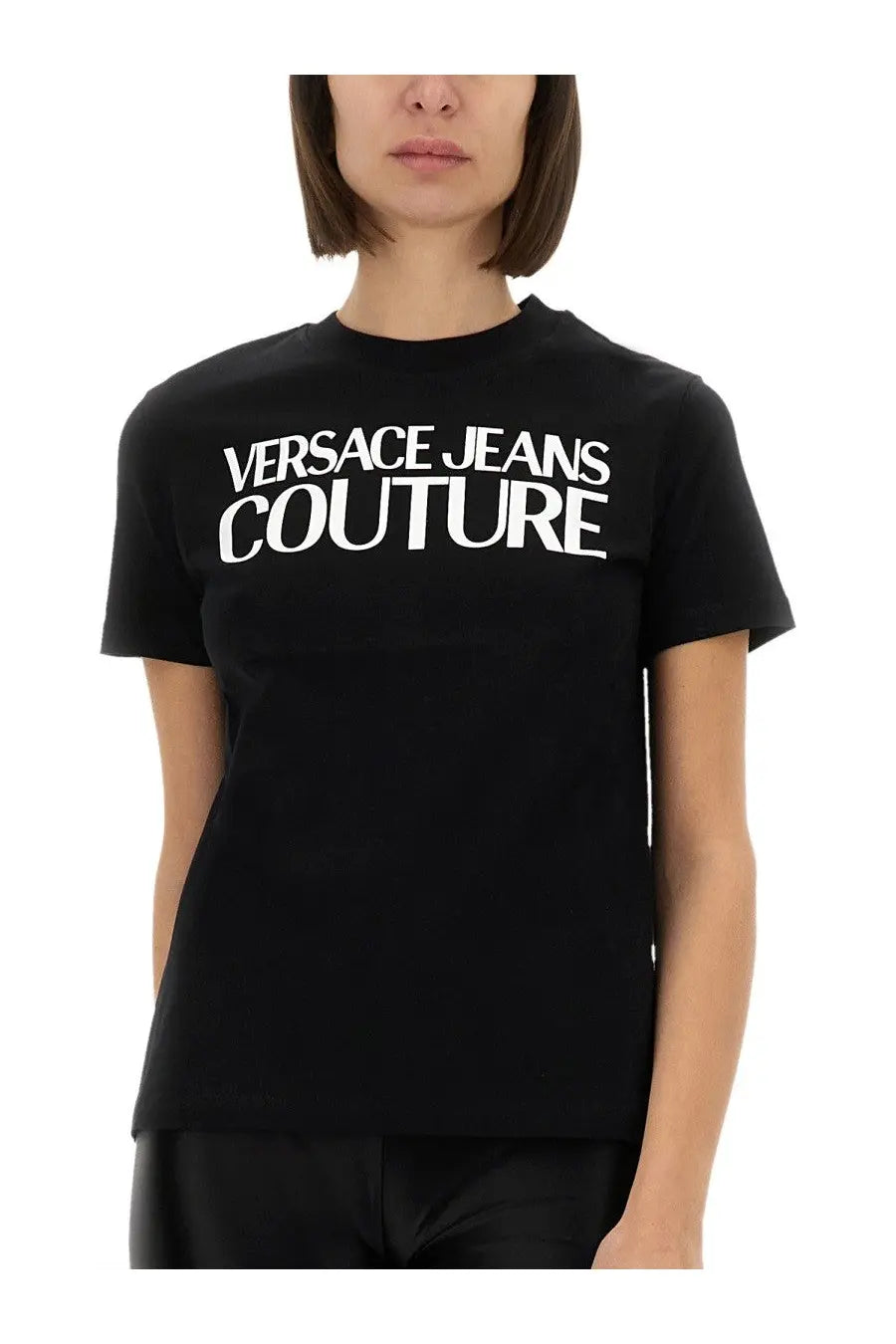 Black versace jeans couture women’s t-shirt with bold white lettering across the chest in cotton fabric