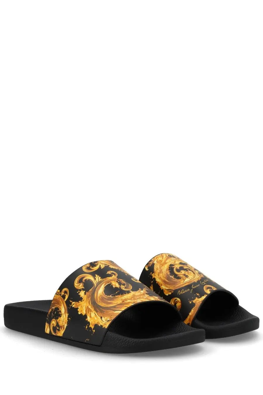 Versace jeans couture women’s black slide sandals with a bold gold ornate baroque pattern on the footbed