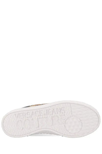 Versace jeans couture women’s sneaker con wave black showing white rubber sole with embossed branding on back side