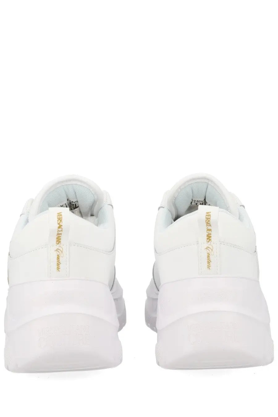 Back view of versace jeans couture women’s white emanuela sneakers with gold heel branding and chunky sculpted sole