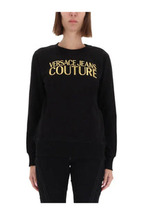 Versace Jeans Couture women’s black long-sleeved sweatshirt with gold logo lettering across the chest
